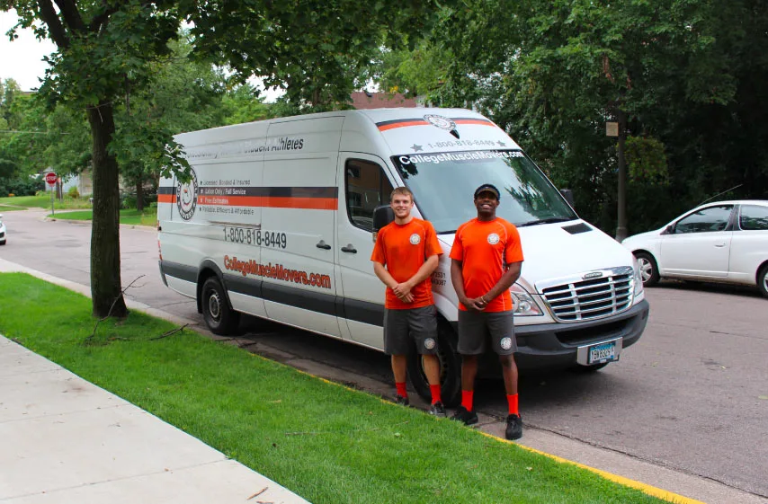 Two College Muscle Movers employees on a labor only moving service