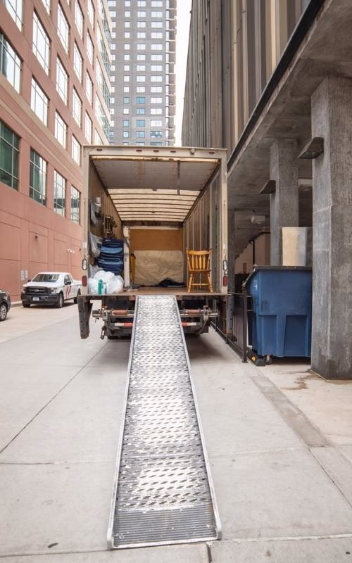 Apartment Move Parking A moving truck parked in an alley outside of an apartment building in downtown Minneapolis.